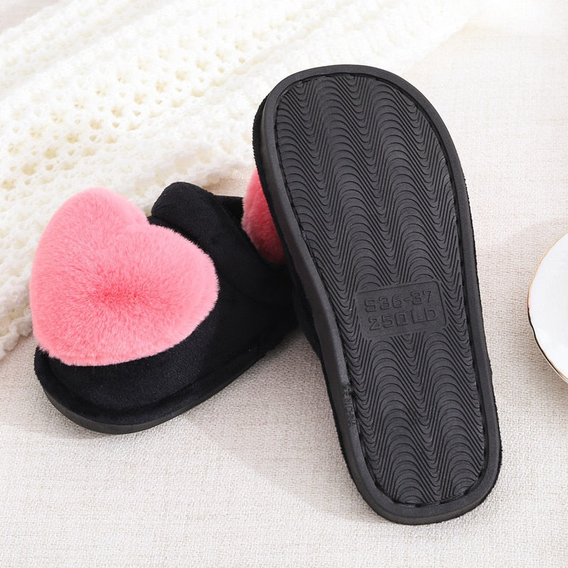 Cute slippers shape heart.