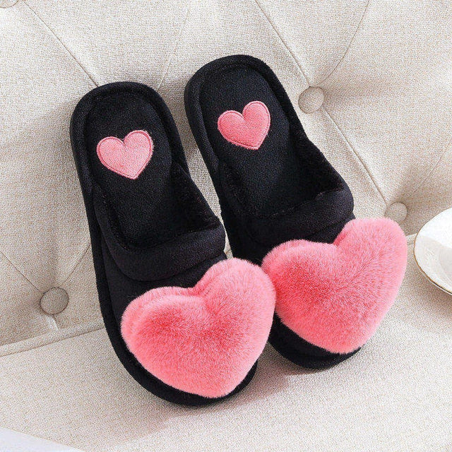 Cute slippers shape heart.