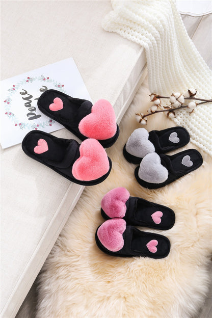 Cute slippers shape heart.