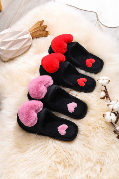 Cute slippers shape heart.