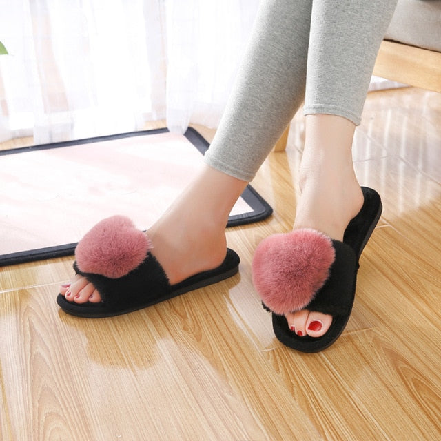 Cute slippers shape heart.